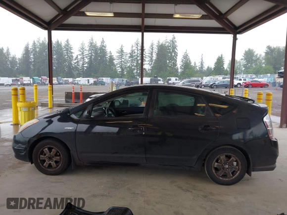 2007 Toyota Prius with VIN JTDKB20U377597003, listed as a IAAI auction lot 42368660 with 276,243 mi miles and . Bid and sale history available at DreamBid. Image 14.
