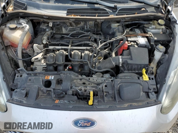 2016 Ford Fiesta S z VIN 3FADP4AJXGM153848, wystawiony jako Copart lot #57865195 z przebiegiem 128 858 mil mil oraz Szkoda całkowita • Salvage title. Historia ofert i sprzedaży dostępna na DreamBid. Obrazek 11.