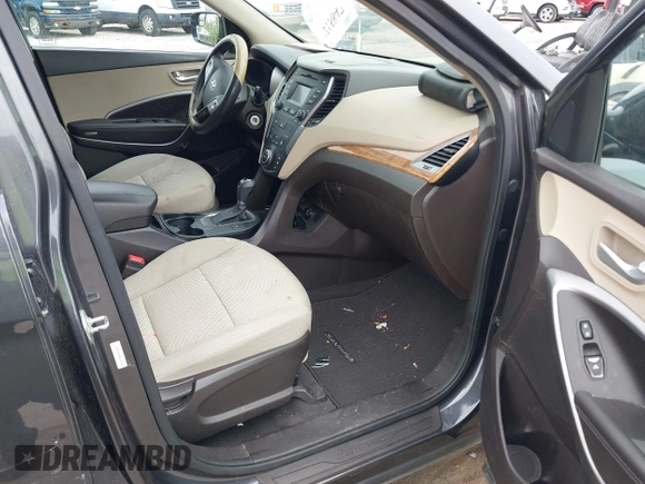 2016 Hyundai Santa Fe z VIN 5XYZU3LB0GG318165, wystawiony jako IAAI lot #42158474 z przebiegiem 74 420 mil mil oraz . Historia ofert i sprzedaży dostępna na DreamBid. Obrazek 5.