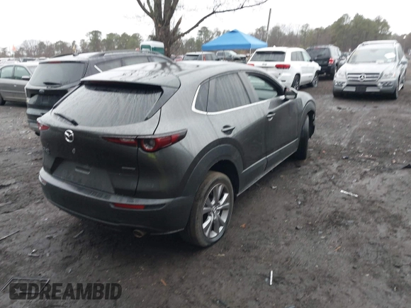 2021 Mazda CX-30 Select with VIN 3MVDMBBL2MM312752, listed as a IAAI auction lot 41933342 with 52,213 mi miles and . Bid and sale history available at DreamBid. Image 4.