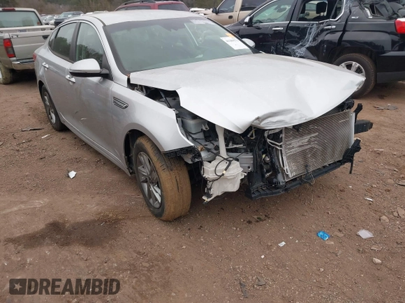 2019 Kia Optima LX z VIN 5XXGT4L34KG332883, wystawiony jako IAAI lot #41389571 z przebiegiem 54 280 mil mil oraz . Historia ofert i sprzedaży dostępna na DreamBid. Obrazek 1.