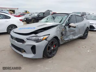 2018 Kia Stinger GT2 with VIN KNAE55LC6J6015897, listed as a IAAI auction lot 41334513 with 126,349 mi miles. Bid and sale history available at carsss.com. Image 2.