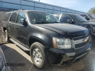 2014 Chevrolet Suburban LT with VIN 1GNSKJE71ER227075, listed as a Copart auction lot 76675654 with 214,113 mi miles and Salvage Title. Bid and sale history available at DreamBid. Image 4.