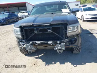 2016 GMC Sierra 1500 SLT with VIN 3GTU2NEC4GG285688, listed as a IAAI auction lot 40394598 with 121,940 mi miles and . Bid and sale history available at DreamBid. Image 6.