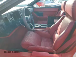 1987 Chevrolet Corvette z VIN 1G1YY3189H5124079, wystawiony jako Copart lot #77180974 z przebiegiem Nie podano mil oraz Szkoda całkowita • Salvage title. Historia ofert i sprzedaży dostępna na DreamBid. Obrazek 7.