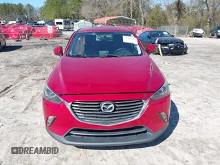 2016 Mazda CX-3 Grand Touring with VIN JM1DKFD72G0129096, listed as a IAAI auction lot 41592893 with 144,860 mi miles. Bid and sale history available at carsss.com. Image 11.