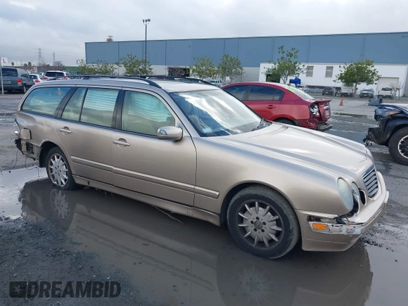 2001 Mercedes-Benz E-Class with VIN WDBJH65J41B349359, listed as a IAAI auction lot 41532318 with 96,375 mi miles. Bid and sale history available at carsss.com. Image 1.
