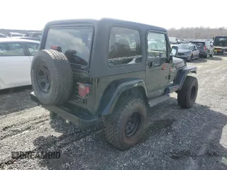 1997 Jeep Wrangler Sahara with VIN 1J4FY49S2VP495910, listed as a Copart auction lot 47794585 with 147,420 mi miles and Salvage Title. Bid and sale history available at carsss.com. Image 3.