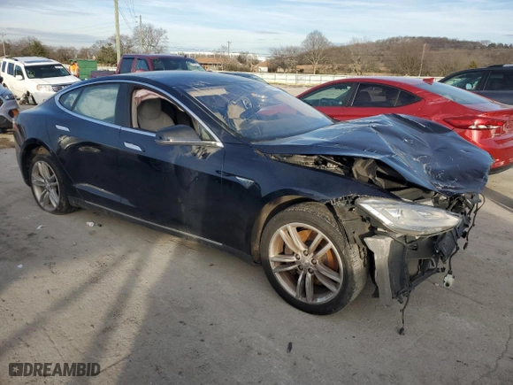 2015 Tesla Model S 85 kWh Battery with VIN 5YJSA1S1XFF080712, listed as a Copart auction lot 86868334 with 0 mi miles and Salvage Title. Bid and sale history available at carsss.com. Image 4.