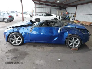 2005 Nissan 350Z Touring with VIN JN1AZ36A45M753058, listed as a IAAI auction lot 41563023 with 1 mi miles. Bid and sale history available at carsss.com. Image 14.