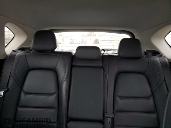 2021 Mazda CX-5 Grand Touring with VIN JM3KFBDM4M1344602, listed as a Copart auction lot 82793724 with 69,322 mi miles and Salvage Title. Bid and sale history available at carsss.com. Image 10.