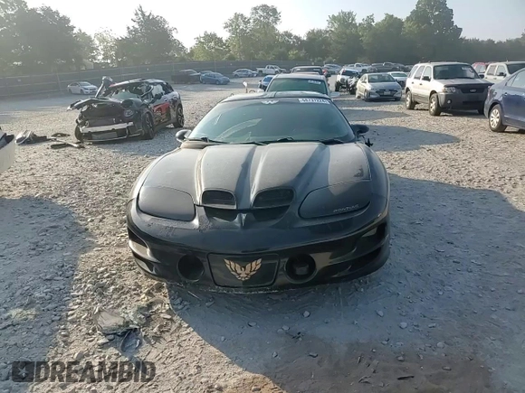 2000 Pontiac Firebird Formula z VIN 2G2FV22G4Y2175318, wystawiony jako Copart lot #68737224 z przebiegiem 229 394 mil mil oraz Szkoda całkowita • Salvage title. Historia ofert i sprzedaży dostępna na DreamBid. Obrazek 10.