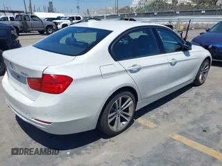 2013 BMW 3 Series 328i xDrive with VIN WBA3B3C56DJ698238, listed as a IAAI auction lot 42333709 with 82,167 mi miles and . Bid and sale history available at DreamBid. Image 4.