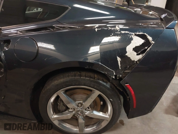 2014 Chevrolet Corvette 2LT with VIN 1G1YC2D72E5130166, listed as a IAAI auction lot 41499814 with 34,959 mi miles and . Bid and sale history available at DreamBid. Image 6.