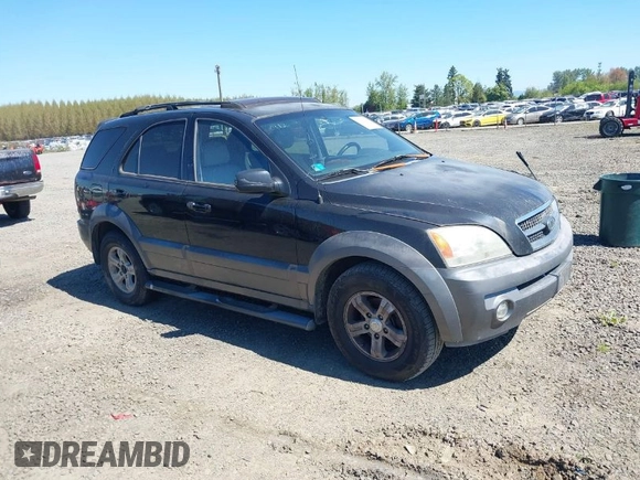2004 Kia Sorento LX with VIN KNDJC733945245222, listed as a IAAI auction lot 42056958 with 272,128 mi miles. Bid and sale history available at carsss.com. Image 1.