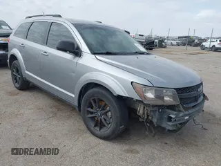 2019 Dodge Journey SE z VIN 3C4PDCBB5KT861358, wystawiony jako IAAI lot #41947841 z przebiegiem 82 099 mil mil oraz . Historia ofert i sprzedaży dostępna na DreamBid. Obrazek 1.