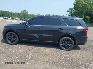 2015 Dodge Durango Limited with VIN 1C4RDJDG6FC917301, listed as a IAAI auction lot 42559104 with 263,499 mi miles and . Bid and sale history available at DreamBid. Image 14.