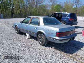 1992 Buick Century Special with VIN 1G4AG54N1N6474333, listed as a IAAI auction lot 41969800 with 213,466 mi miles. Bid and sale history available at carsss.com. Image 3.
