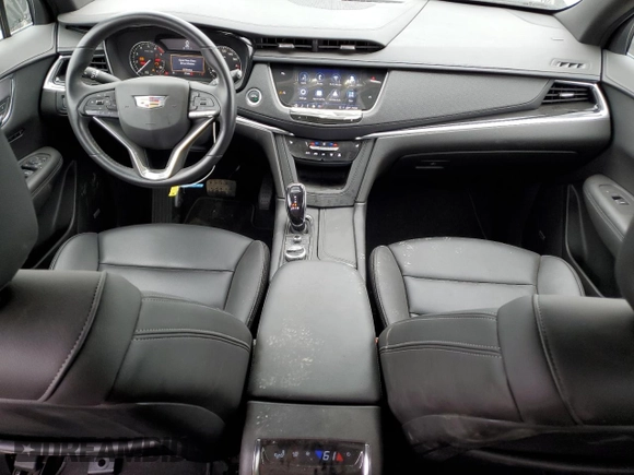 2023 Cadillac XT6 FWD Luxury z VIN 1GYKPAR47PZ147139, wystawiony jako Copart lot #50783595 z przebiegiem 27 684 mil mil oraz Szkoda całkowita • Salvage title. Historia ofert i sprzedaży dostępna na DreamBid. Obrazek 8.