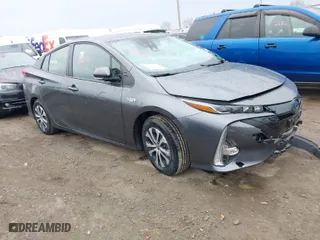 2021 Toyota Prius Prime LE with VIN JTDKAMFP3M3188311, listed as a IAAI auction lot 41668815 with NaN miles. Bid and sale history available at carsss.com. Image 1.