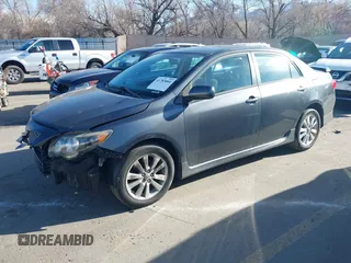 2009 Toyota Corolla with VIN 1NXBU40E89Z100073, listed as a IAAI auction lot 41783064 with 144,866 mi miles. Bid and sale history available at carsss.com. Image 18.