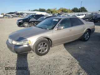 2002 Cadillac Seville Luxury SLS z VIN 1G6KS54Y22U149573, wystawiony jako Copart lot #71468564 z przebiegiem 158 498 mil mil oraz Czysty tytuł • Clean title. Historia ofert i sprzedaży dostępna na DreamBid. Obrazek 1.