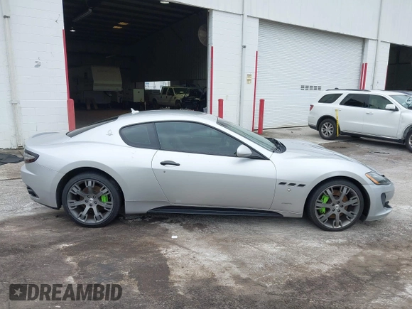 2013 Maserati GranTurismo Sport with VIN ZAM45VLA8D0072490, listed as a IAAI auction lot 42438872 with 84,214 mi miles and . Bid and sale history available at DreamBid. Image 13.