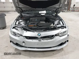 2016 BMW 4 Series 428i xDrive with VIN WBA4C9C5XGG138843, listed as a IAAI auction lot 41747358 with 63,804 mi miles and . Bid and sale history available at DreamBid. Image 6.