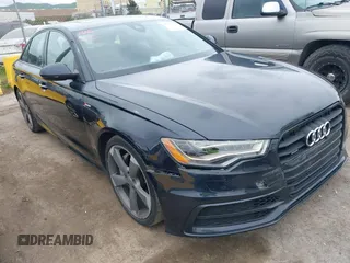2015 Audi A6 3.0T Prestige with VIN WAUHGAFC1FN009076, listed as a IAAI auction lot 41735331 with 122,550 mi miles. Bid and sale history available at carsss.com. Image 1.