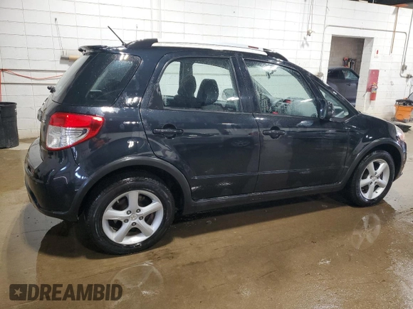 2009 Suzuki SX4 Touring AWD with VIN JS2YB417496202243, listed as a Copart auction lot 53842055 with 70,544 mi miles and Salvage Title. Bid and sale history available at DreamBid. Image 3.