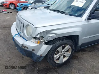 2011 Jeep Patriot Sport with VIN 1J4NF1GBXBD118483, listed as a IAAI auction lot 42039168 with 174,048 mi miles. Bid and sale history available at carsss.com. Image 6.