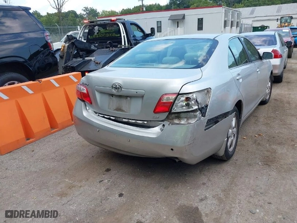 2007 Toyota Camry CE with VIN 4T1BE46K77U140703, listed as a IAAI auction lot 40193348 with 183,987 mi miles. Bid and sale history available at carsss.com. Image 4.