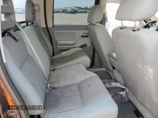 2005 Dodge Dakota ST z VIN 1D7HE28K35S235225, wystawiony jako Copart lot #57684725 z przebiegiem 184 546 mil mil oraz Szkoda całkowita • Salvage title. Historia ofert i sprzedaży dostępna na DreamBid. Obrazek 10.
