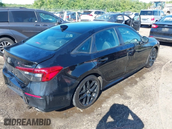 2023 Honda Civic Sport with VIN 2HGFE2F56PH509382, listed as a IAAI auction lot 42296205 with 125,584 mi miles and . Bid and sale history available at DreamBid. Image 4.