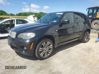 2011 BMW X5 50i with VIN 5UXZV8C56BL419646, listed as a Copart auction lot 57493515 with 186,192 mi miles and Salvage title. Bid and sale history available at DreamBid. Image 1.