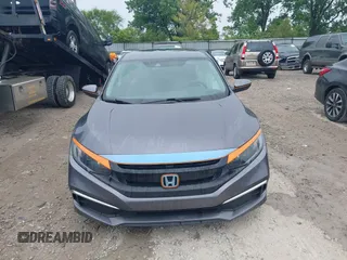 2020 Honda Civic LX z VIN 19XFC2F66LE012481, wystawiony jako IAAI lot #42297600 z przebiegiem 56 602 mil mil oraz . Historia ofert i sprzedaży dostępna na DreamBid. Obrazek 13.
