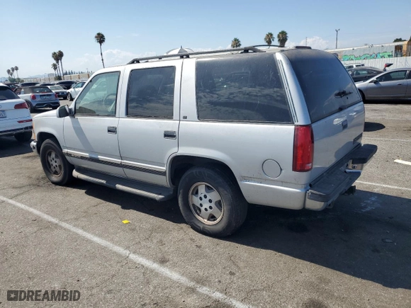 1995 Chevrolet Tahoe with VIN 1GNEK13K6SJ415105, listed as a Copart auction lot 65960124 with 219,821 mi miles and Salvage Title. Bid and sale history available at carsss.com. Image 2.
