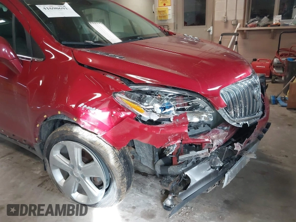 2015 Buick Encore Convenience with VIN KL4CJFSB4FB264728, listed as a IAAI auction lot 41690691 with 101,731 mi miles. Bid and sale history available at carsss.com. Image 6.