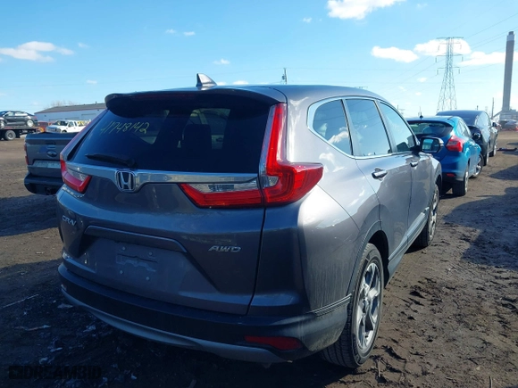 2018 Honda CR-V EX-L with VIN 7FARW2H89JE051063, listed as a IAAI auction lot 41748142 with 90,834 mi miles. Bid and sale history available at carsss.com. Image 4.