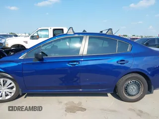 2018 Subaru Impreza with VIN 4S3GKAA65J3609408, listed as a IAAI auction lot 42397821 with Not provided miles and . Bid and sale history available at DreamBid. Image 14.