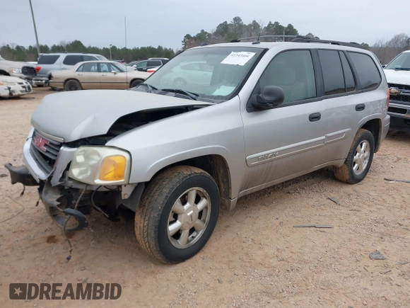 2005 GMC Envoy SLT with VIN 1GKDT13S452263166, listed as a IAAI auction lot 41543466 with 166,999 mi miles. Bid and sale history available at carsss.com. Image 2.