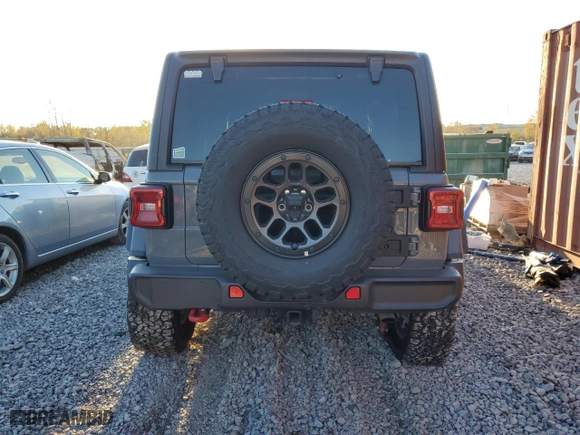 2023 Jeep Wrangler Rubicon with VIN 1C4JJXFG9PW678123, listed as a Copart auction lot 81574334 with 19,621 mi miles and Salvage Title. Bid and sale history available at carsss.com. Image 6.