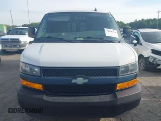 2019 Chevrolet Express Cargo Van with VIN 1GCWGAFP0K1170744, listed as a IAAI auction lot 42076354 with 218,813 mi miles. Bid and sale history available at carsss.com. Image 12.