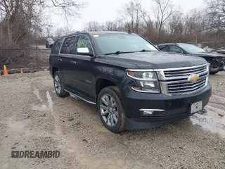 2016 Chevrolet Tahoe LTZ z VIN 1GNSKCKC2GR104305, wystawiony jako IAAI lot #41697868 z przebiegiem 124 670 mil mil oraz . Historia ofert i sprzedaży dostępna na DreamBid. Obrazek 1.