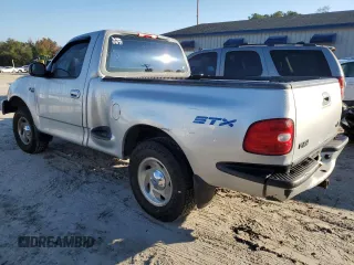 1998 Ford F-150 with VIN 2FTZF07W8WCA96137, listed as a Copart auction lot 82886074 with 181,690 mi miles and Salvage title. Bid and sale history available at DreamBid. Image 2.