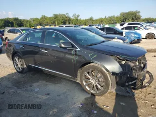 2013 Cadillac XTS Luxury with VIN 2G61P5S32D9235227, listed as a Copart auction lot 61825305 with 59,853 mi miles and Salvage title. Bid and sale history available at DreamBid. Image 4.