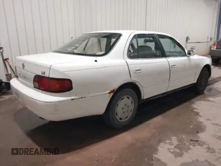 1995 Toyota Camry LE z VIN JT2SK12E8S0299203, wystawiony jako IAAI lot #39607993 z przebiegiem 193 374 mil mil oraz . Historia ofert i sprzedaży dostępna na DreamBid. Obrazek 4.