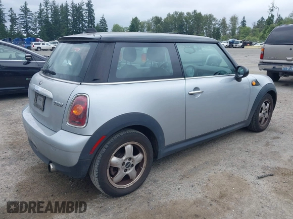 2007 MINI Hardtop with VIN WMWMF33557TU61953, listed as a IAAI auction lot 42678840 with 139,665 mi miles and . Bid and sale history available at DreamBid. Image 4.