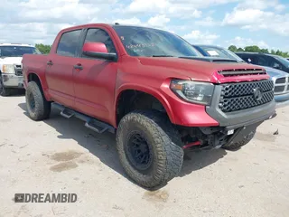 2019 Toyota Tundra SR5 z VIN 5TFDY5F11KX827927, wystawiony jako IAAI lot #42445138 z przebiegiem 94 075 mil mil oraz . Historia ofert i sprzedaży dostępna na DreamBid. Obrazek 1.