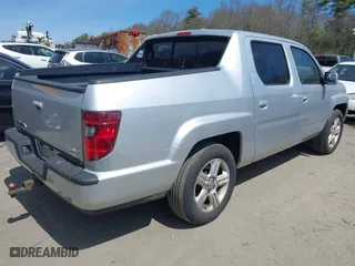 2009 Honda Ridgeline RTL with VIN 5FPYK16549B104258, listed as a IAAI auction lot 42073316 with 88,507 mi miles. Bid and sale history available at carsss.com. Image 4.